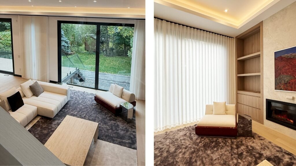 Custom white sheer panels and modern drapes installed by Starlight Shutter in a luxury Toronto living room.