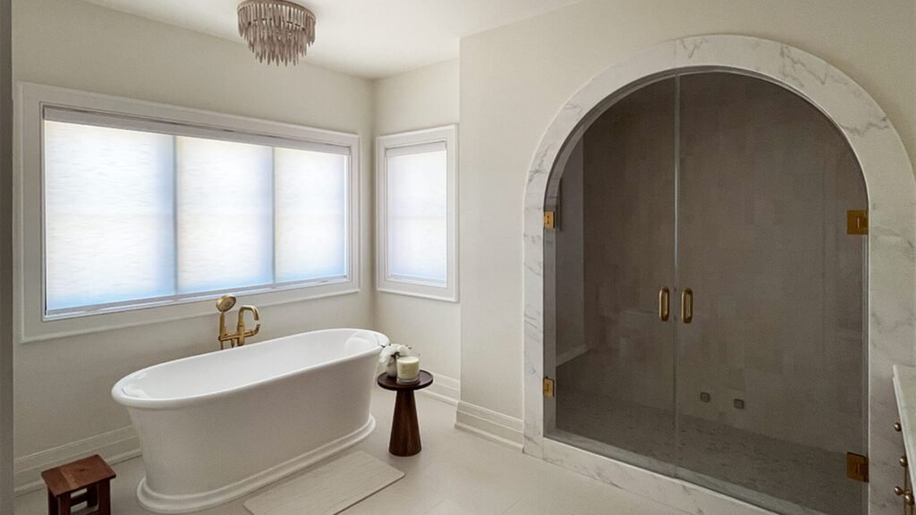 Professional Starlight Shutter installer fitting custom roller shades in a GTA home.