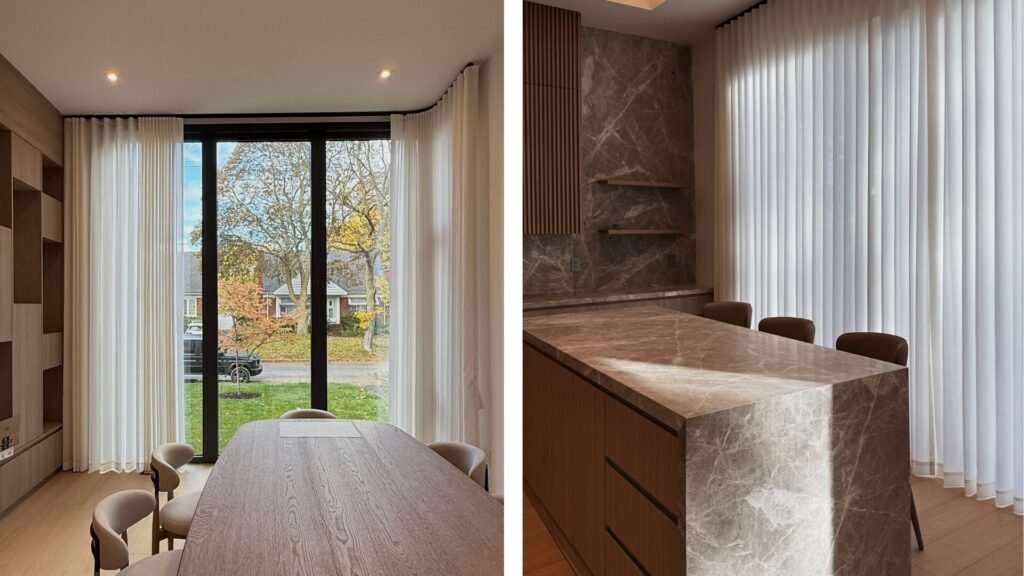 Bespoke window sheers complementing a marble kitchen island and modern dining set in a Toronto home.
