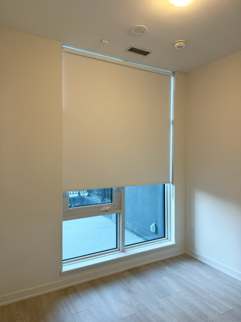 black out roller shades in new condo bedroom