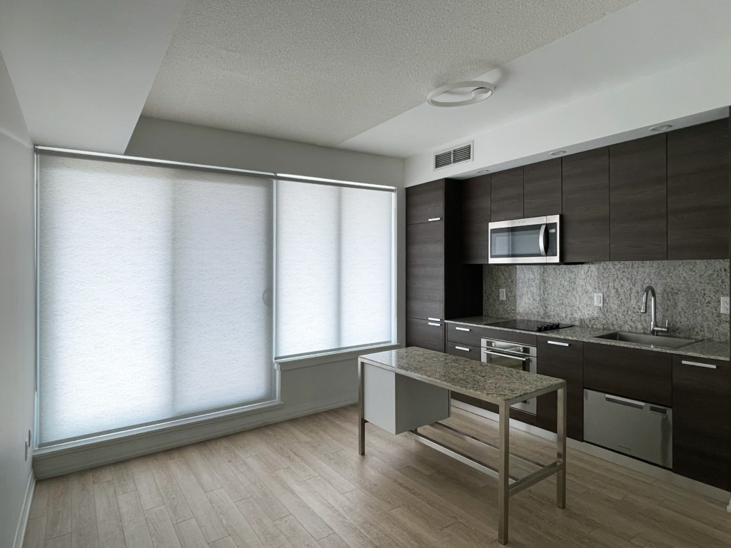 2 blinds installed by starlight shutter expert at a toronto new condo living room