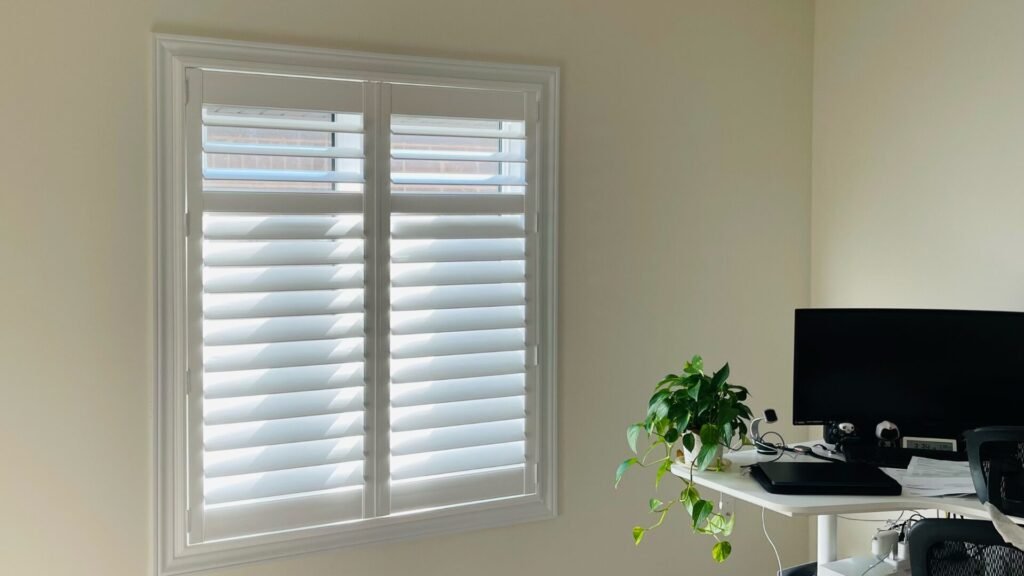 shutters installed by starlight shutter proffessional in a study room