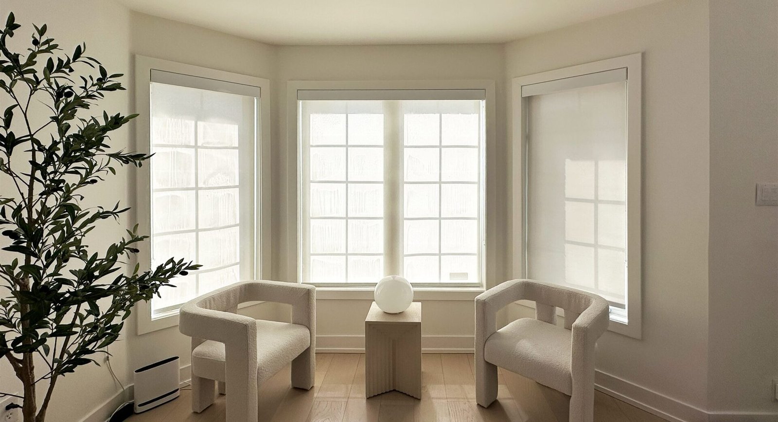 Detail of premium custom shades filtering soft daylight in a Toronto home