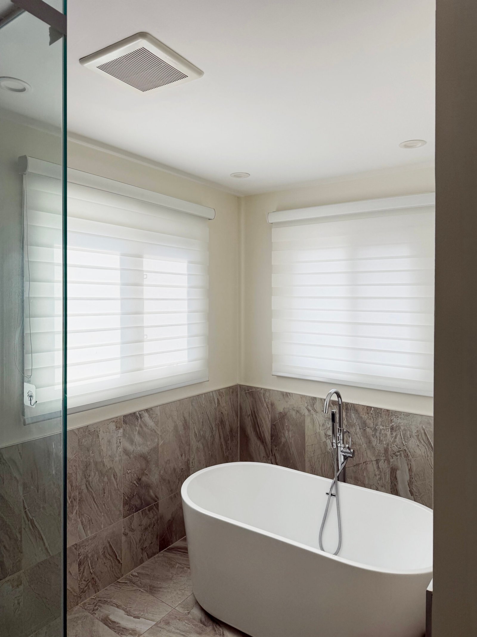 White zebra blinds in an ensuite bathroom in a GTA home