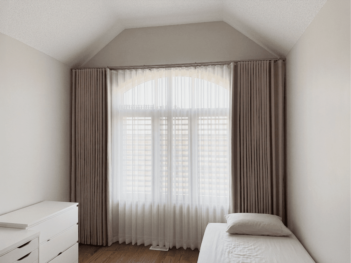 Custom blinds installed in a Milton living room by Starlight Shutter