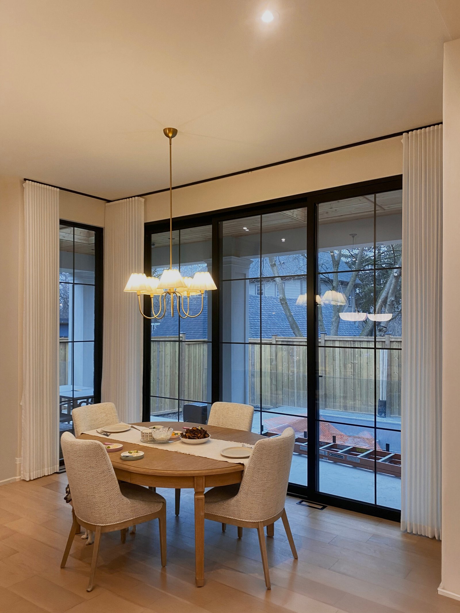 Custom window treatments installed in a sunlit Mississauga home by Starlight Shutter