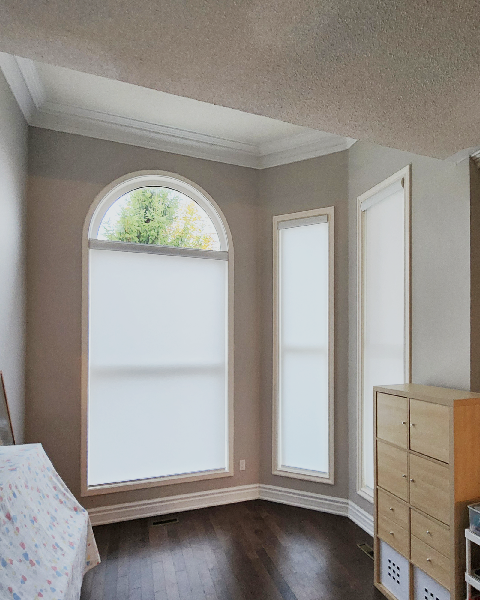 Custom blinds installed in a Richmond Hill living room by Starlight Shutter