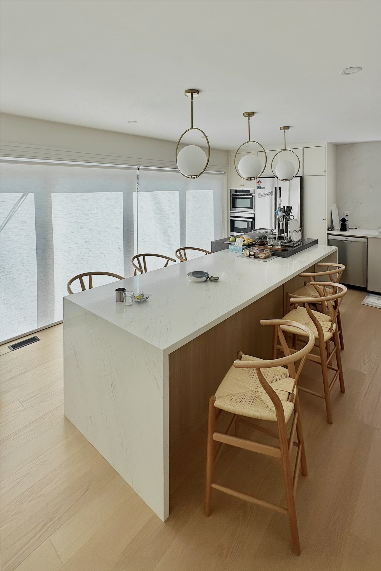 Premium custom roller shades filtering soft daylight in a Toronto home