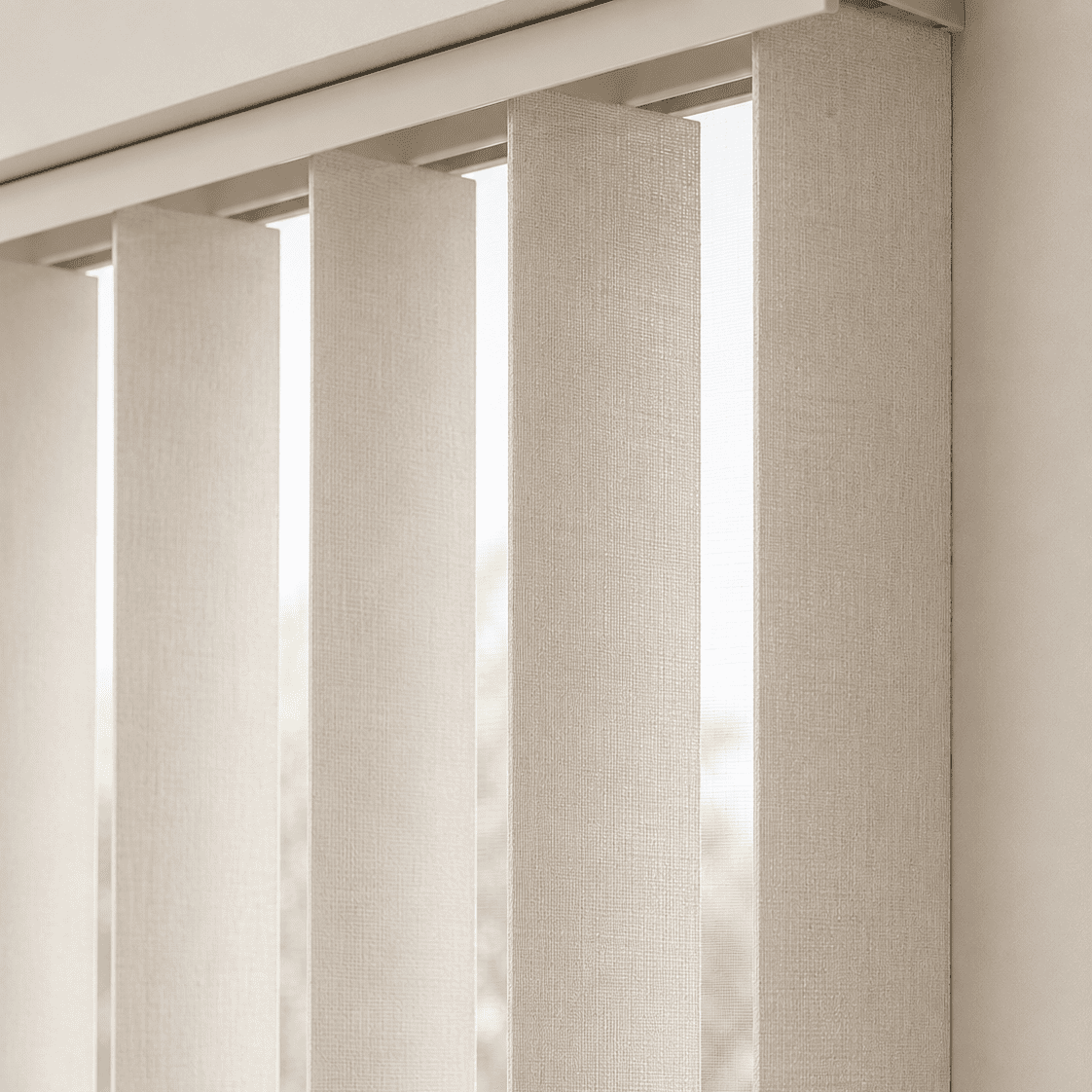 Vertical blinds close up across a wide window in a Toronto home