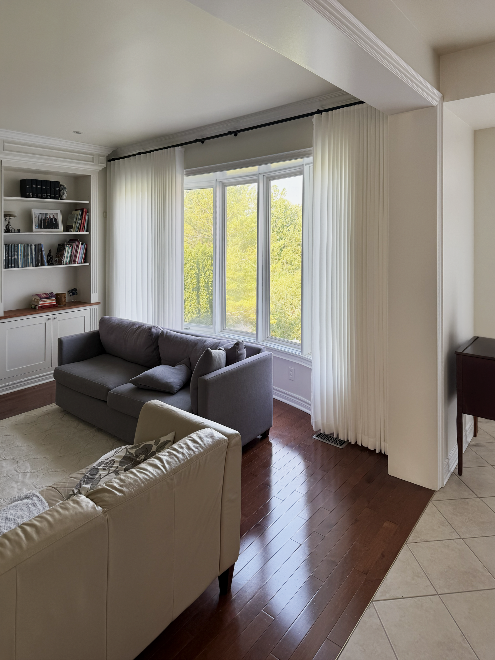 Custom window treatments installed in a bright Brampton home by Starlight Shutter