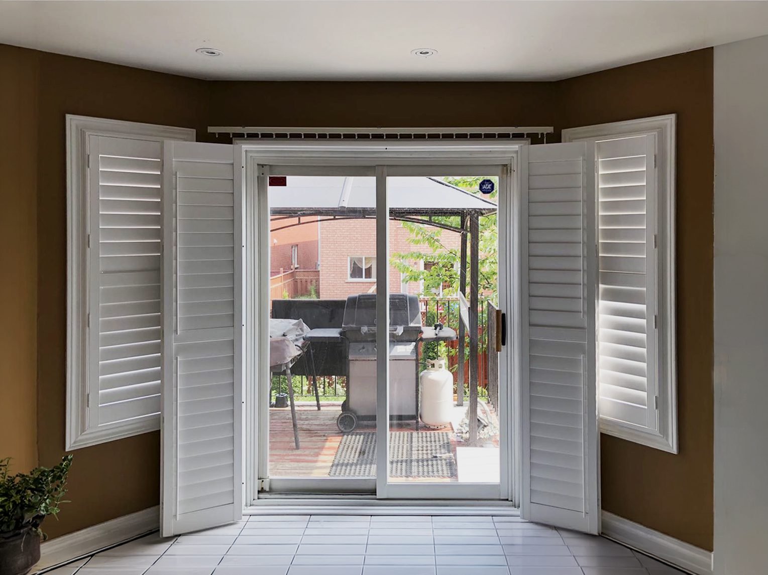 Close-up of bi-fold shutter louvres and hinged panels