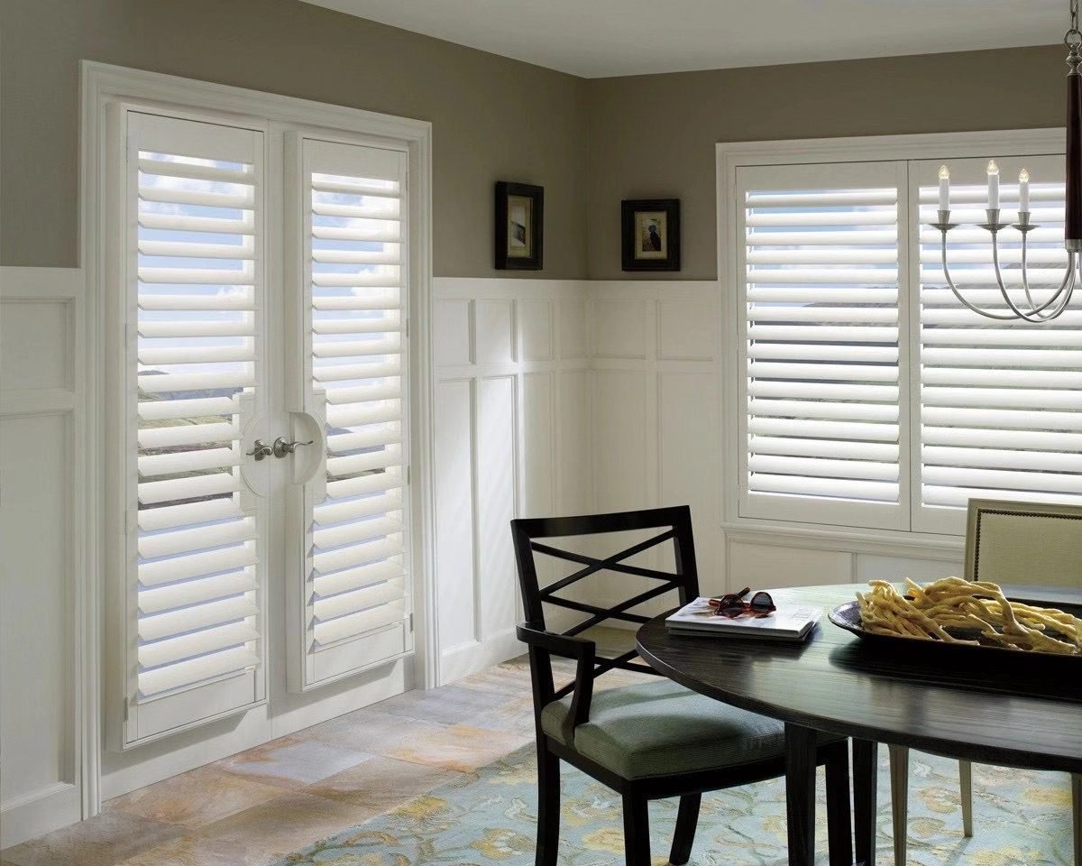 Custom shutters fitted to a glazed door in a Toronto home