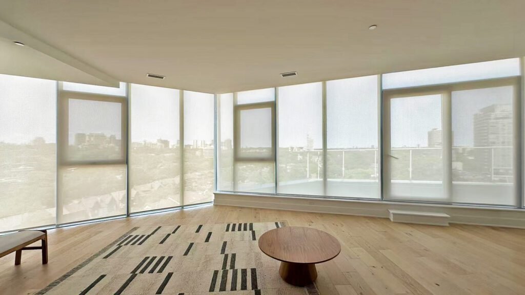 Solar shades on a large window in a Toronto home
