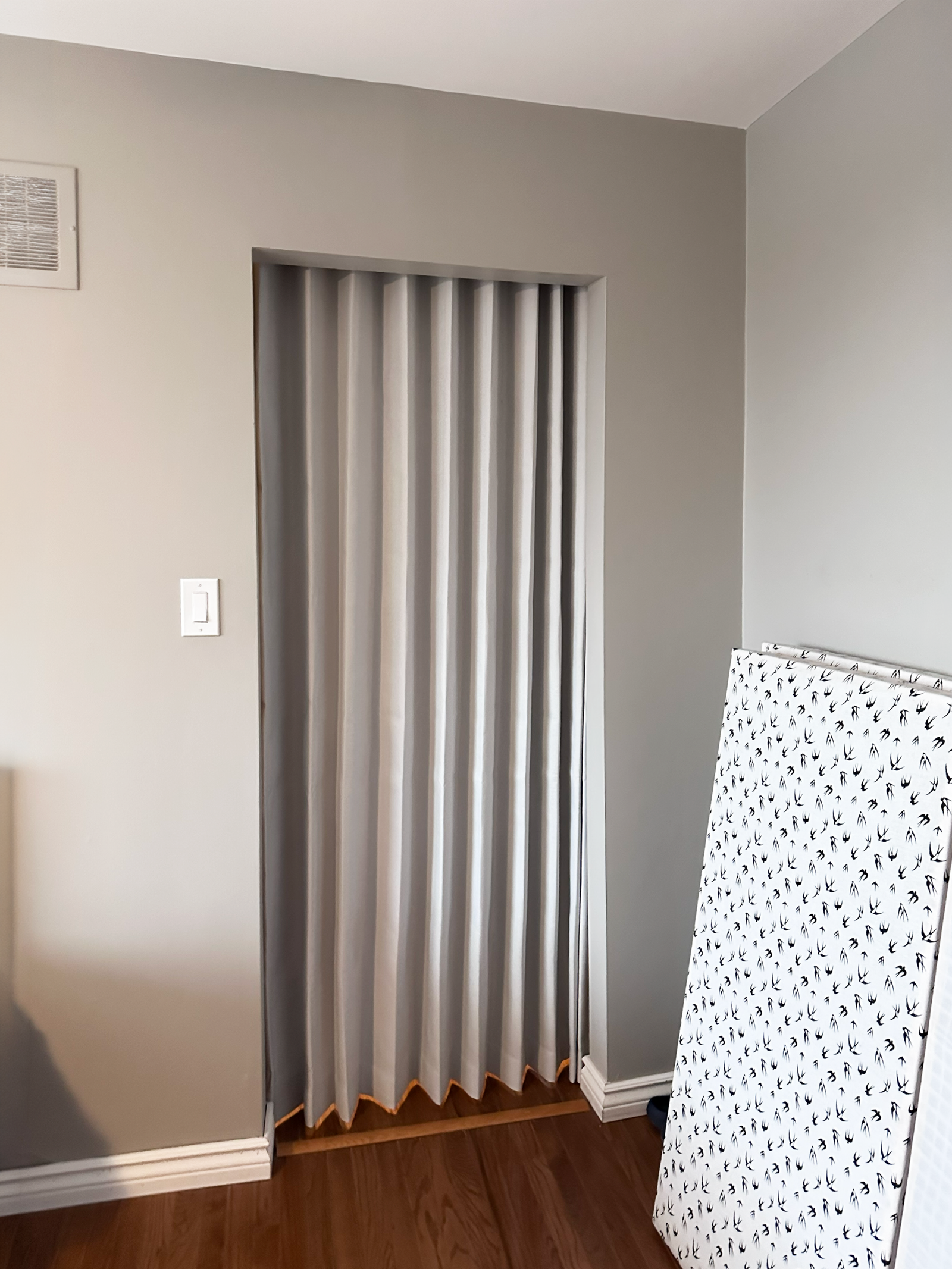 Custom curtains dressing a patio door in an Ajax home