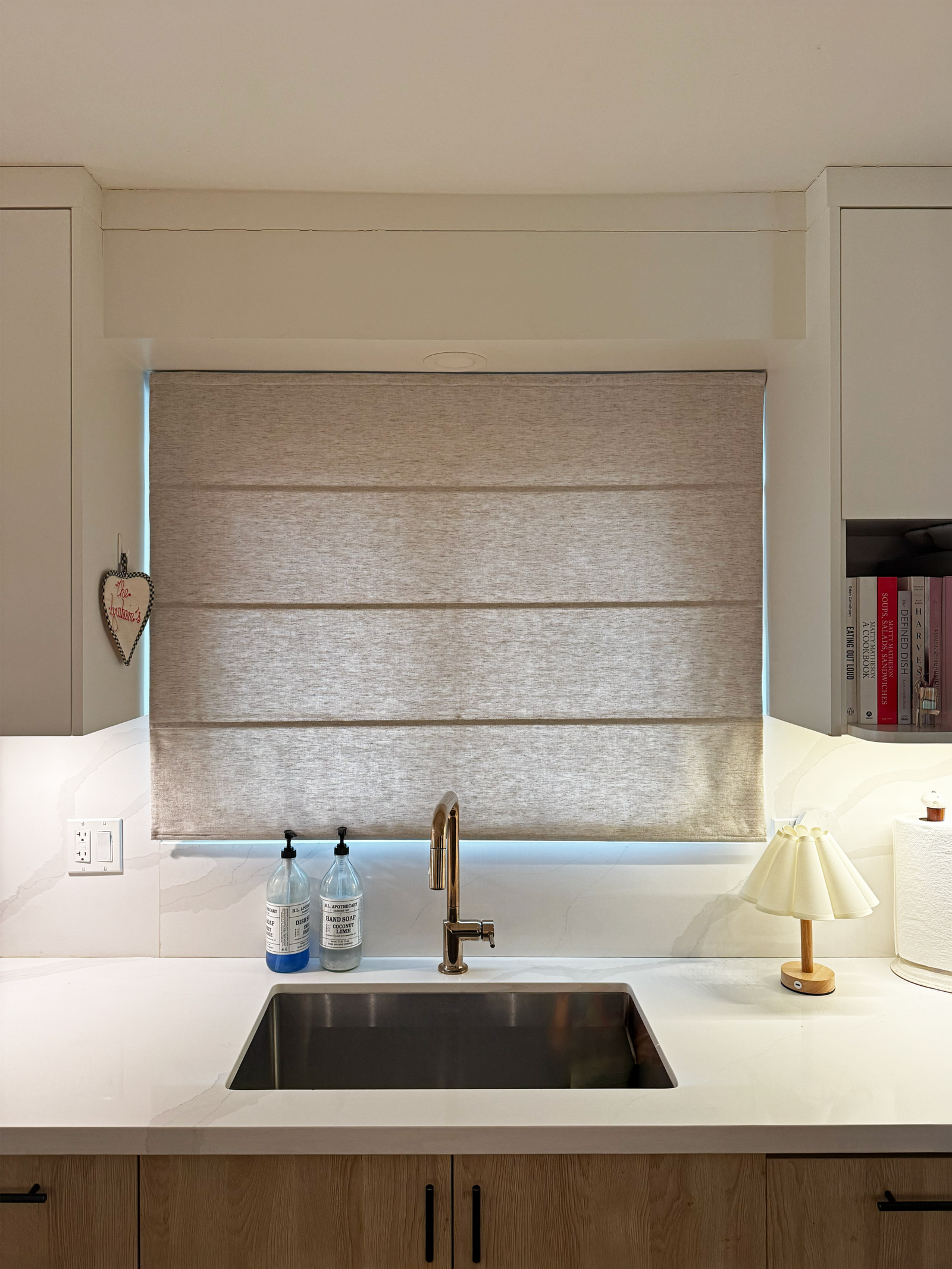 Custom Roman shades in a sunlit Durham Region kitchen, installed by Starlight Shutter
