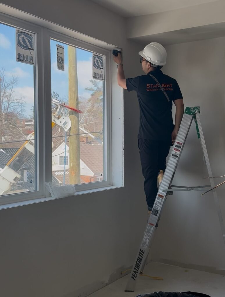 starlight shutter technician measuring a new build home