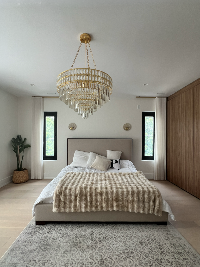 Linen drapery panels on narrow bedroom windows in a Mississauga home.